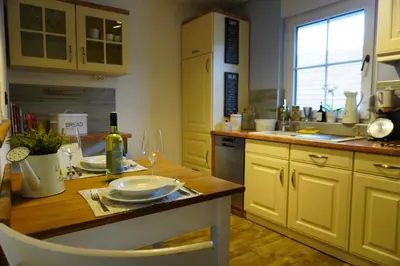 Küche/Küchenzeile in der Unterkunft Ferienwohnung Tabakbauer - Auszeit in der Pfalz