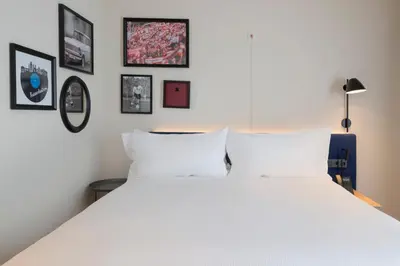 Ein Bett oder Betten in einem Zimmer der Unterkunft Hampton By Hilton Kaiserslautern