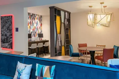 Ein Sitzbereich in der Unterkunft Hampton By Hilton Kaiserslautern
