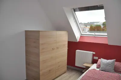 Ein Bett oder Betten in einem Zimmer der Unterkunft Ferienwohnung Vollert