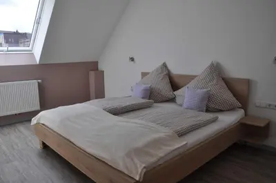 Ein Bett oder Betten in einem Zimmer der Unterkunft Ferienwohnung Vollert