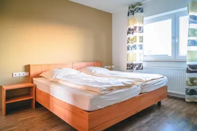 Ein Bett oder Betten in einem Zimmer der Unterkunft Ferienhof Laurentius