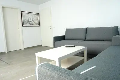 Ein Sitzbereich in der Unterkunft Ferienwohnung Menge