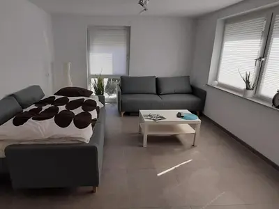 Ein Sitzbereich in der Unterkunft Ferienwohnung Menge