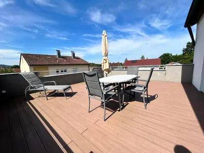 Ein Balkon oder eine Terrasse in der Unterkunft Ferienwohnung Menge