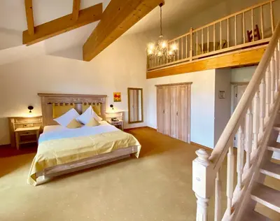 Ein Bett oder Betten in einem Zimmer der Unterkunft Hotel Sonnenhof Aspach