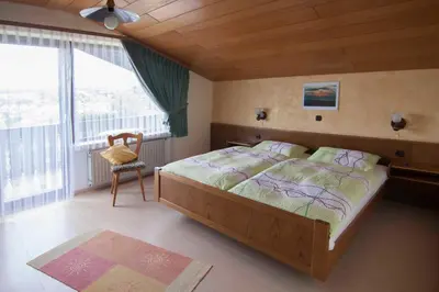 Ein Bett oder Betten in einem Zimmer der Unterkunft Ferienwohnungen Haus Fernblick