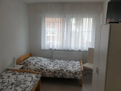 Ein Bett oder Betten in einem Zimmer der Unterkunft Wohnung, Zimmer in Frankfurt Flughafen zu vermieten