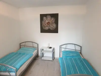 Ein Bett oder Betten in einem Zimmer der Unterkunft Wohnung, Zimmer in Frankfurt Flughafen zu vermieten
