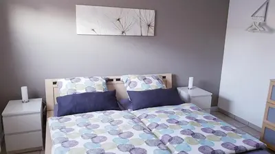 Ein Bett oder Betten in einem Zimmer der Unterkunft Nähe Mainz - Ferienwohnung - Apartment Breivogel in Wörrstadt