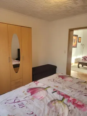Ein Bett oder Betten in einem Zimmer der Unterkunft Ferienwohnung Jasmin in Schönau bei Heidelberg FEWO 2