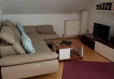 Ein Sitzbereich in der Unterkunft Ferienwohnung Weiß Wachtenburg