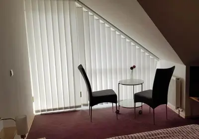 Ein Sitzbereich in der Unterkunft Ferienwohnung Weiß Wachtenburg