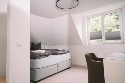 Ein Bett oder Betten in einem Zimmer der Unterkunft Weingut Petershof