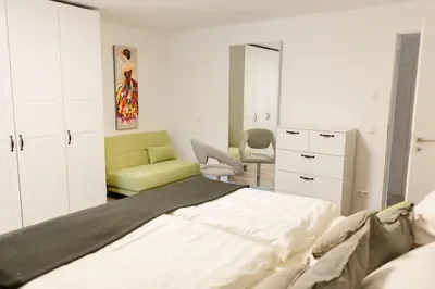 Ein Bett oder Betten in einem Zimmer der Unterkunft Brehm Living