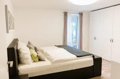 Ein Bett oder Betten in einem Zimmer der Unterkunft Brehm Living