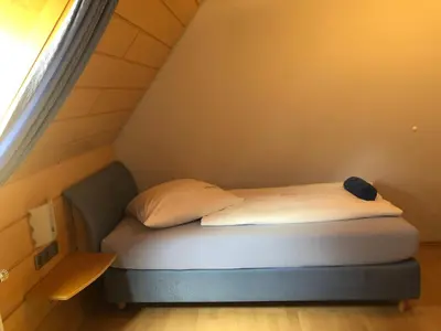 Ein Bett oder Betten in einem Zimmer der Unterkunft Gasthof zum Hirsch