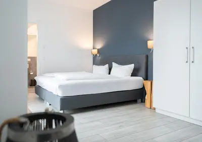 Ein Bett oder Betten in einem Zimmer der Unterkunft Prime Park Apartment Aschaffenburg