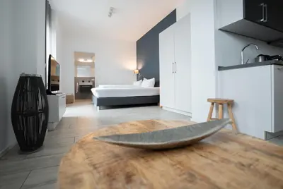 Ein Bett oder Betten in einem Zimmer der Unterkunft Prime Park Apartment Aschaffenburg