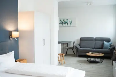 Ein Sitzbereich in der Unterkunft Prime Park Apartment Aschaffenburg