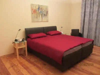 Ein Bett oder Betten in einem Zimmer der Unterkunft Exklusive Gästezimmer Landau