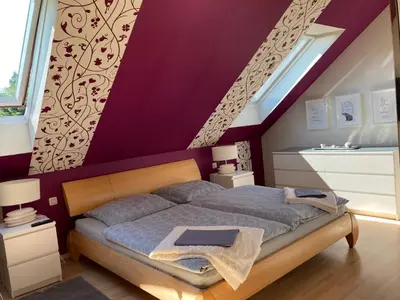 Ein Bett oder Betten in einem Zimmer der Unterkunft Ferienwohnung Finkenschlag