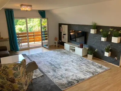 Ein Sitzbereich in der Unterkunft Ferienwohnung Finkenschlag