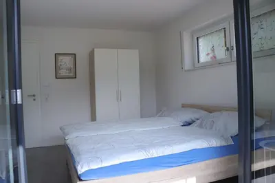 Ein Bett oder Betten in einem Zimmer der Unterkunft Fewo Haus Edith