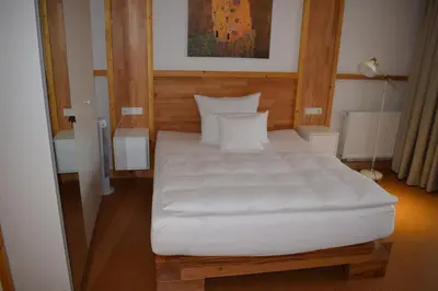 Ein Bett oder Betten in einem Zimmer der Unterkunft Apartmenthaus Erlenbach