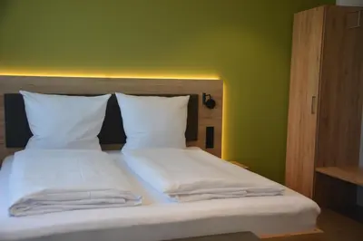 Ein Bett oder Betten in einem Zimmer der Unterkunft Weingut Bugner Meizelhof