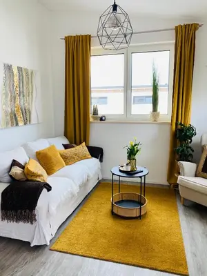 Ein Sitzbereich in der Unterkunft Aurum Apartment