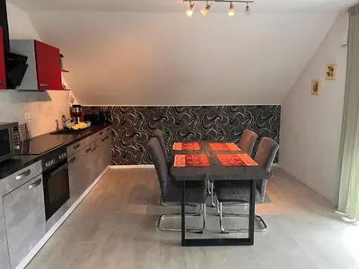 Küche/Küchenzeile in der Unterkunft Ferienwohnung im Wonnegau Portugieser-Suite