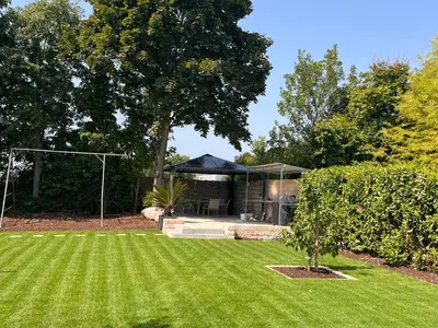 Ein Garten an der Unterkunft Ferienwohnung im Wonnegau Portugieser-Suite