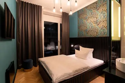 Ein Bett oder Betten in einem Zimmer der Unterkunft 133 Boutique Hotel