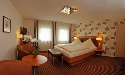 Ein Bett oder Betten in einem Zimmer der Unterkunft Hotel Nothwang