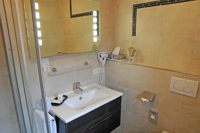 Ein Badezimmer in der Unterkunft Hotel Nothwang