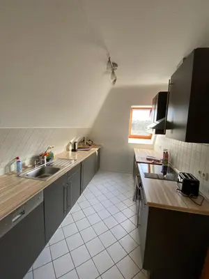 Küche/Küchenzeile in der Unterkunft Ferienwohnung - Balkon, Klima, Parkplatz