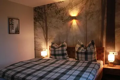 Ein Bett oder Betten in einem Zimmer der Unterkunft HOTEL ALTES THEATER Heilbronn