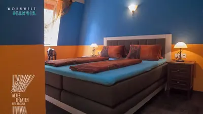 Ein Bett oder Betten in einem Zimmer der Unterkunft HOTEL ALTES THEATER Heilbronn