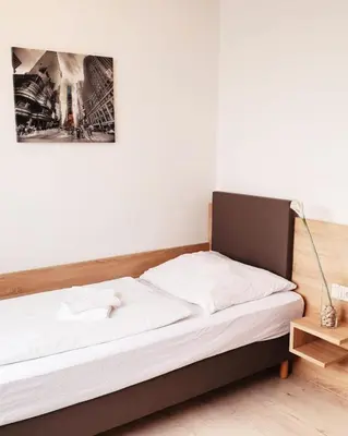 Ein Bett oder Betten in einem Zimmer der Unterkunft Hotel Rodgau