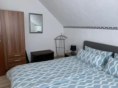 Ein Bett oder Betten in einem Zimmer der Unterkunft Apartment Adam
