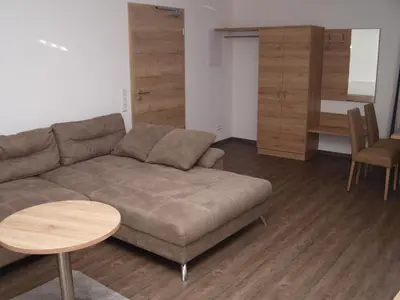 Ein Sitzbereich in der Unterkunft Hotel Anker garni