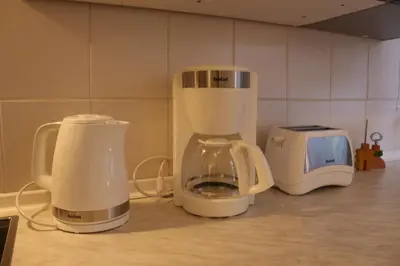Kaffee-/Teezubehör in der Unterkunft Appartment in Walldorf mit Schlafzimmer, Küche und Bad