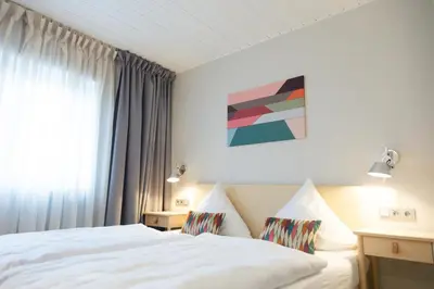 Ein Bett oder Betten in einem Zimmer der Unterkunft Hotel Herrnbrod & Ständecke