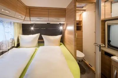 Ein Bett oder Betten in einem Zimmer der Unterkunft Hotel Am Gottesauer Schloss