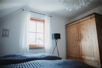 Ein Bett oder Betten in einem Zimmer der Unterkunft Gästehaus Janson
