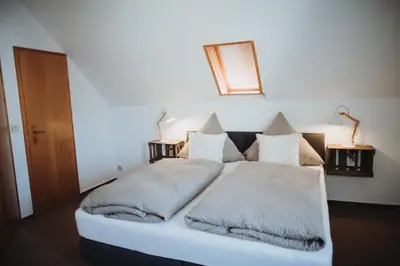 Ein Bett oder Betten in einem Zimmer der Unterkunft Gästehaus Janson