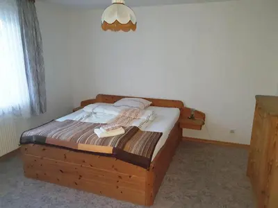 Ein Bett oder Betten in einem Zimmer der Unterkunft Gästehaus Maurer