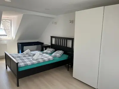 Ein Bett oder Betten in einem Zimmer der Unterkunft Main-Apartments