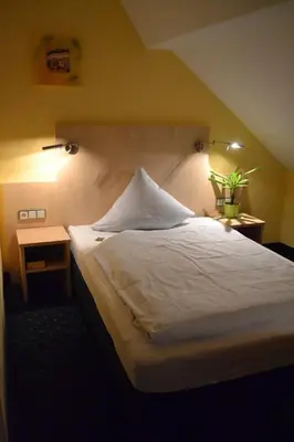 Ein Bett oder Betten in einem Zimmer der Unterkunft Landgasthof Hock